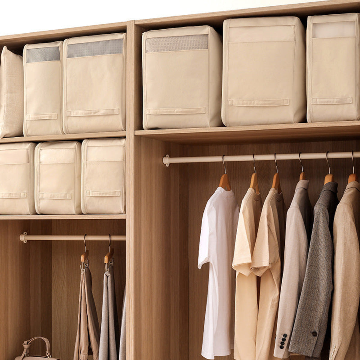 Closet with wooden shelves containing folded clothes and hanging garments.
