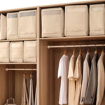 Closet with wooden shelves containing folded clothes and hanging garments.
